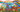 Ecru Puzzles - Elisa Lara Campos Acme Rainbow Construction Company Wooden Jigsaw Puzzle